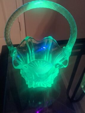 Vintage Fenton Glass Vulcan Basket with twisted handle. Glows Under a 365 UV.